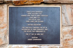Plaque on the base of Sherwood's Statue